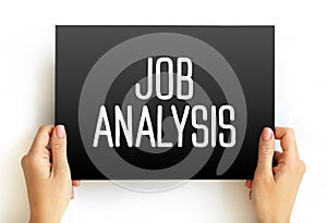 Job Analysis - process of studying a job to determine which activities and responsibilities it includes, text concept on card