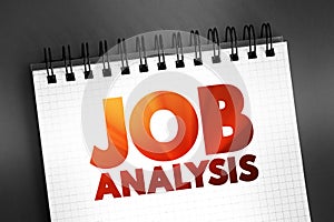 Job Analysis - process of studying a job to determine which activities and responsibilities it includes, text concept on notepad