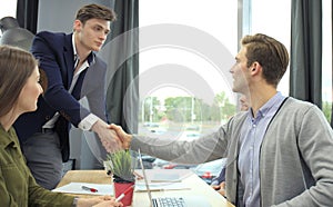 Job applicant having interview. Handshake while job interviewing.