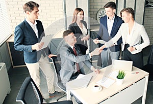 Job applicant having interview. Handshake while job interviewing.