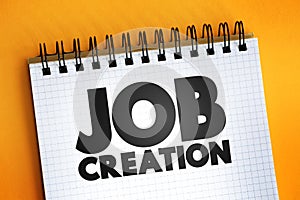 Job Creation text on notepad, business concept background