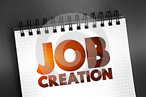 Job Creation text on notepad, business concept background