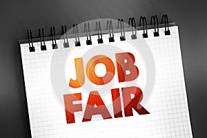 Job Fair - event in which employers, recruiters, and schools give information to potential employees, text on notepad, concept