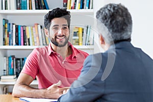 Job interview of brazilian male apprentice