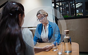 Job interview or business meeting face - to-face. Two business women at a meeting