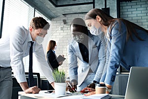 Job interview with the employer, business team in medical masks listen to candidate answers