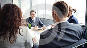 Job interview with the employer, businessman listen to candidate answers.