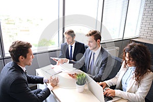 Job interview with the employer, businessman listen to candidate answers. photo