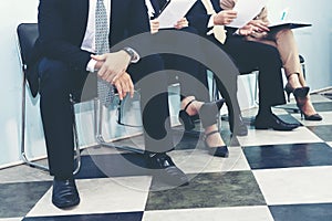 Job Interview. Group of asian people review document while waiting for job interview