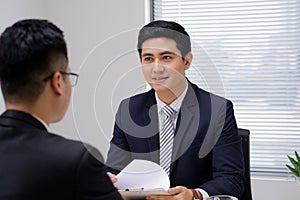 Job interview of two business professionals. Greeting new colleague