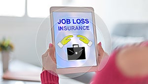 Job loss insurance concept on a tablet