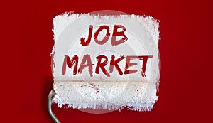 JOB MARKET .One open can of paint with white brush on red background. Top view