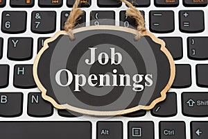 Job Openings message on chalkboard on a keyboard