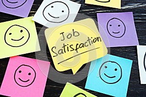 Job satisfaction sign on the sheet and smiles