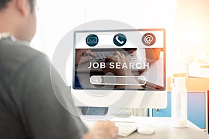 Job search concept, find your career. Man looking at online website by computer