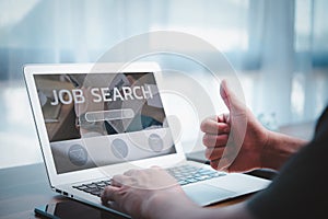 Job search concept, find your career, Man looking at online website by laptop computer.People searching for vacancies or position