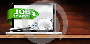 Job Search Concept - Laptop Computer and a Magnifying Glass