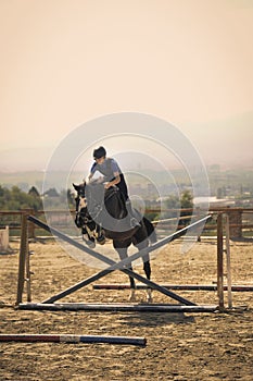 Jockey riding a fast thoroughbred horse