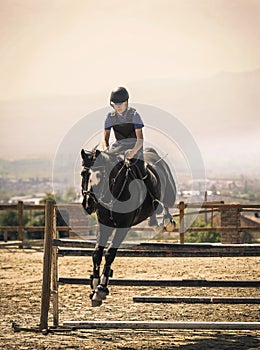Jockey riding a fast thoroughbred horse