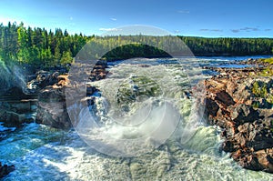 Jockfall waterfall in Norrbotten, Sweden