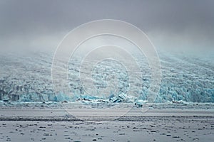 Joekulsarlon Glacier Lagoon scarp of giant Vatnajoekull glacier in Iceland photo