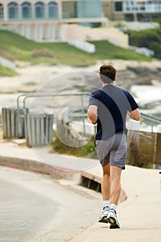 Jogger on boardwalk