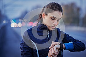 Jogger checking smart watch