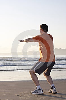 Jogger doing squats