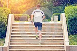 Jogger running up on stairs