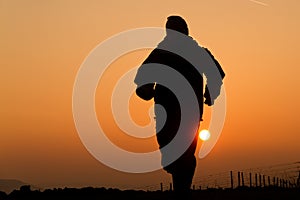 A jogger in sunset