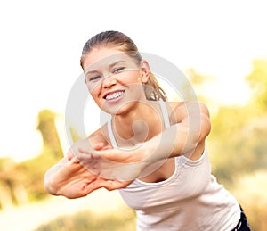 Jogger woman stretching hands