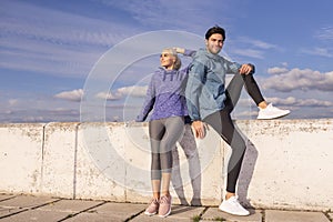 Jogging Concepts. One Positive Runners  Couple Posing Together At River Bank Outside as Runners During Training Relaxation Outdoor