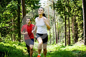 Jogging in forest photo