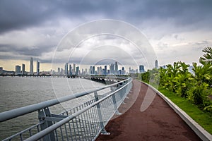 Jogging path wit skyline view in Cinta Costera - Panama City, Panama photo