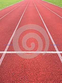 Jogging track, outdoor oval stadium with a tartan track.