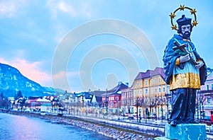 Johannes Nepomuk statue and the evening town, Bad Ischl, Salzkammergut, Austria