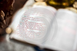John 3:16 scripture with reading magnifying glasses