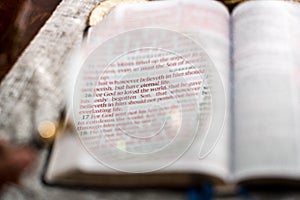 John 3:16 scripture with reading magnifying glasses