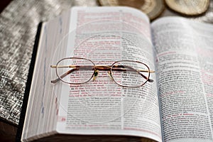 John 3:16 scripture with reading magnifying glasses