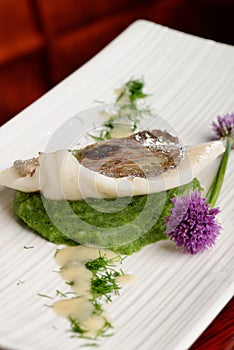 John Dory fish fillet on spinach