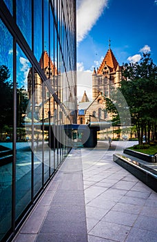 The John Hancock Building and Trinity Church, in Boston, Massachusetts.