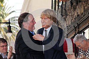 John Lasseter, Owen Wilson