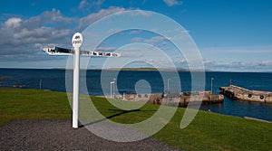 John 'o Groats New Signpost and Harbour, Caithness, Scotland, UK