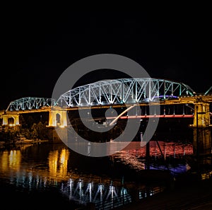 John Seigenthaler Pedestrian bridge illuminated at night in downtown Nashville, Tennessee