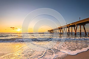 Johnnie Mercers Fishing Pier at sunrise in Wrightsville Beach east of Wilmington,North Carolina,United State.