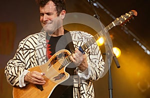 Johnny Clegg performing on stage