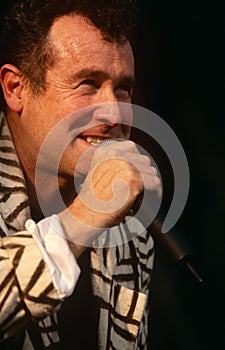 Johnny Clegg performing on stage