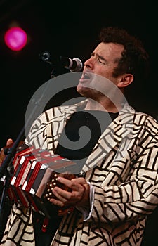 Johnny Clegg performing on stage
