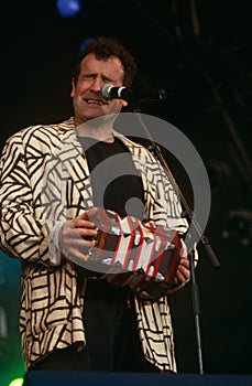 Johnny Clegg performing on stage