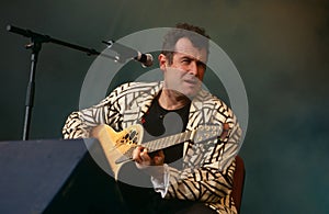 Johnny Clegg performing on stage
